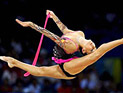 Олимпийская чемпионка-2008 россиянка Евгения Канаева завоевала две золотые медали чемпионата мира по художественной гимнастике, который проходит в эти дни в Японии, выиграв упражнения с обручем и со скакалкой