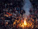 Фанаты сборной Сербии в матче против сборной Хорватии, 27 января 2012 года Фанаты сборной Сербии в матче против сборной Хорватии, 27 января 2012 года