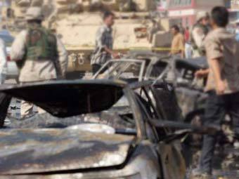 Последствия взрыва автомобиля в Ираке, фото Reuters 