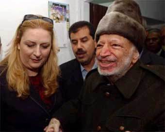 Ясир Арафат с женой Сухой. Фото Reuters