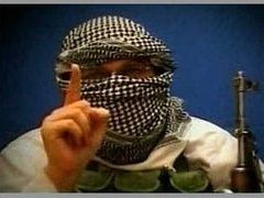 Кадр одной из террористических видеозаписей Кадр одной из террористических видеозаписей