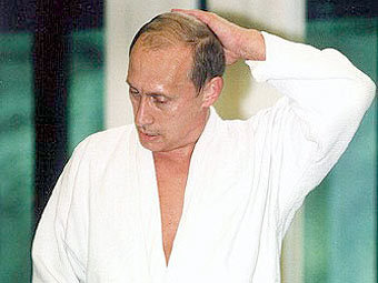 Владимир Путин на тренировке. Фото пресс-службы президента России 