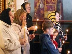 Траурная месса в одной из церквей Иркутска. Фото AFP Траурная месса в одной из церквей Иркутска. Фото AFP