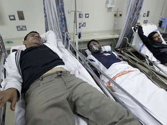 Раненые участники столкновений в Бахрейне. Фото ©AFP
