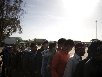 Беженцы на границе Ливии с Тунисом. Фото ©AFP