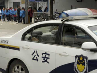 Автомобиль китайской полиции. Фото ©AFP