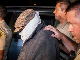 Накула Бэссли Накула в сопровождении полиции Лос-Анджелеса. Фото Reuters