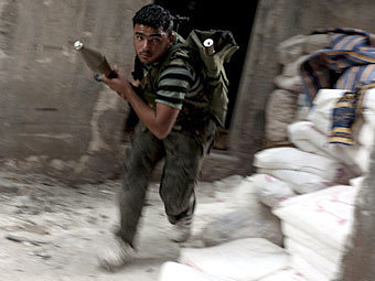 Сирийский повстанец. Архивное фото ©AFP