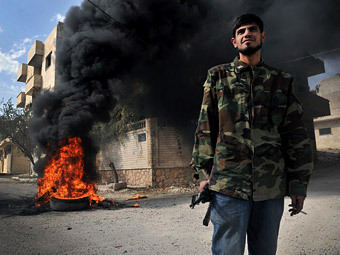 Сирийский повстанец. Фото (с)AP