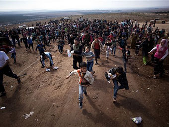 Сирийские беженцы. Фото ©AP