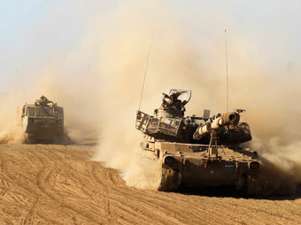 Израильская бронетехника в районе границы с Сирией. Фото Reuters
