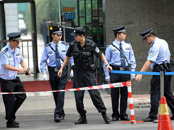 Китайские полицейские. Фото ©AFP