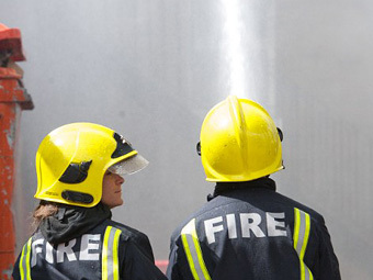 Британские пожарные. Фото: Andrew Cowie / ©AFP