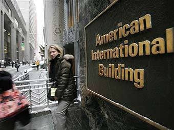 - AIG.  ©AP
